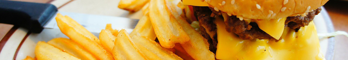 Eating Burger Greek Cheesesteak at King Kong Dodge restaurant in Omaha, NE.